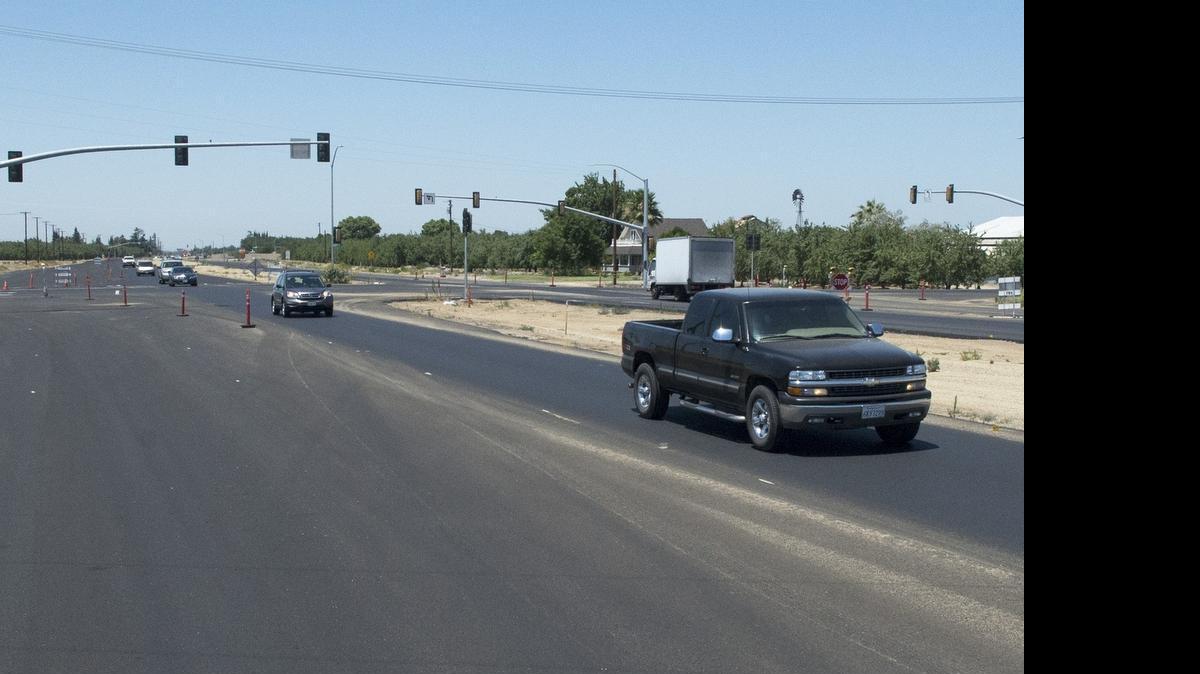 
Cars drive on the newly widened section of Kiernan Road that runs between McHenry Avenue and Dale Road in Modesto on Friday.
