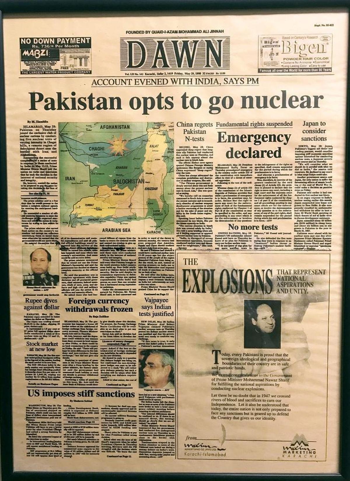 A front page of the newspaper Dawn is on display inside the news organization’s headquarters in Karachi, Pakistan. Dawn is the most prestigious English language daily in the country.