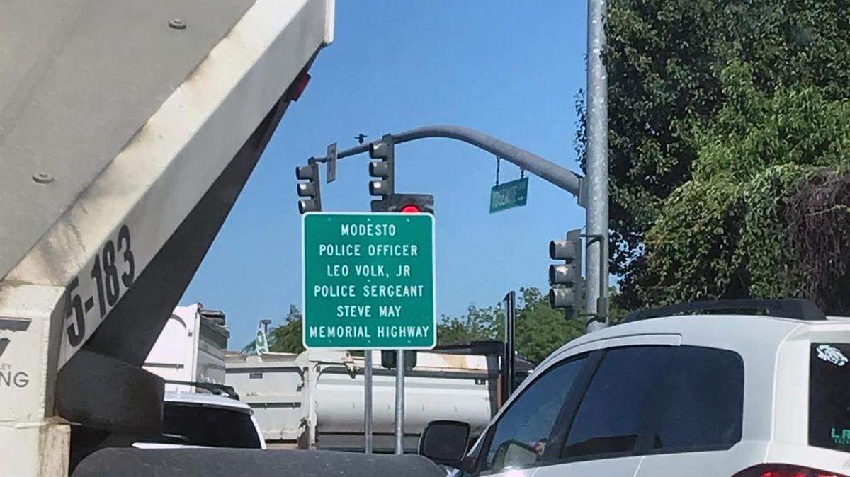 A sign announcing the Memorial Highway for Steve May and Leo Volk Jr. is pictured on Yosemite Blvd at Claus Road in Modesto, Calif. in May of this year.