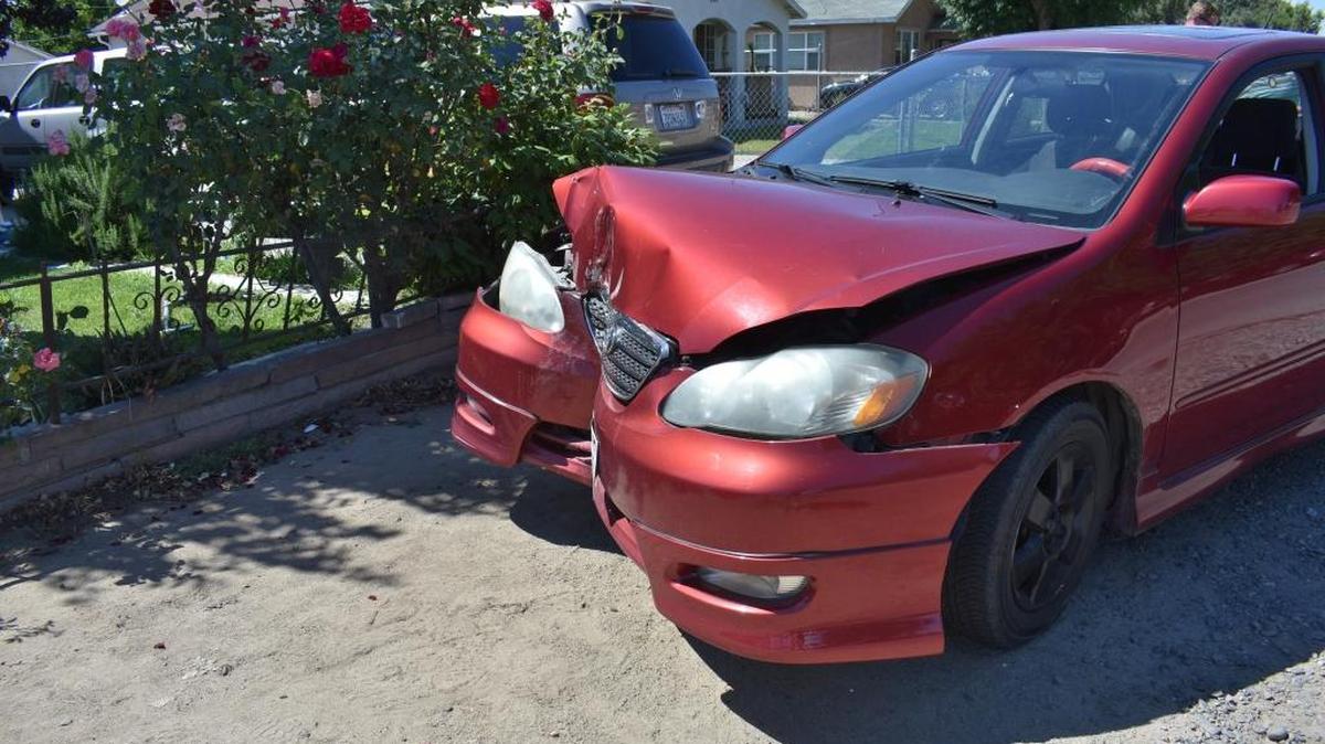 A 17-year-old boy driving unlicensed was found sitting in this crashed Toyota Corolla on Eureka Street in south Modesto on Wednesday afternoon. He fled a CHP officer on foot and said he had no recollection of the crash. The teen apparently suffered a medical episode, the CHP said.
