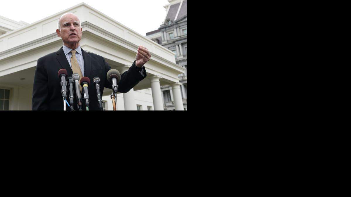 Speaking to reporters outside the White House on Friday, Gov. Jerry Brown defended President Barack Obama’s efforts to spare from deportation millions of people in the U.S. illegally. He called opposition “at best is troglodyte, and at worst un-Christian.”