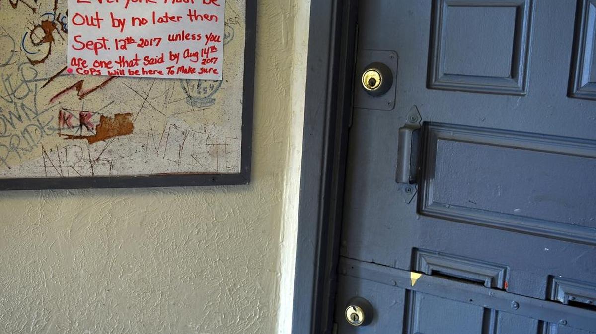A handwritten sign is pictured on a bulletin board Monday (08-14-17) in the lobby of 624 Ninth Street in Modesto, Calif.