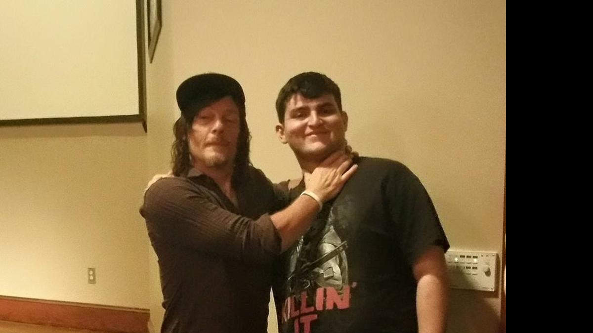 
“The Walking Dead” actor Norman Reedus, left, clowns around with Ceres teen Joe Murillo during their Make-A-Wish meeting on June 13  in Georgia.
