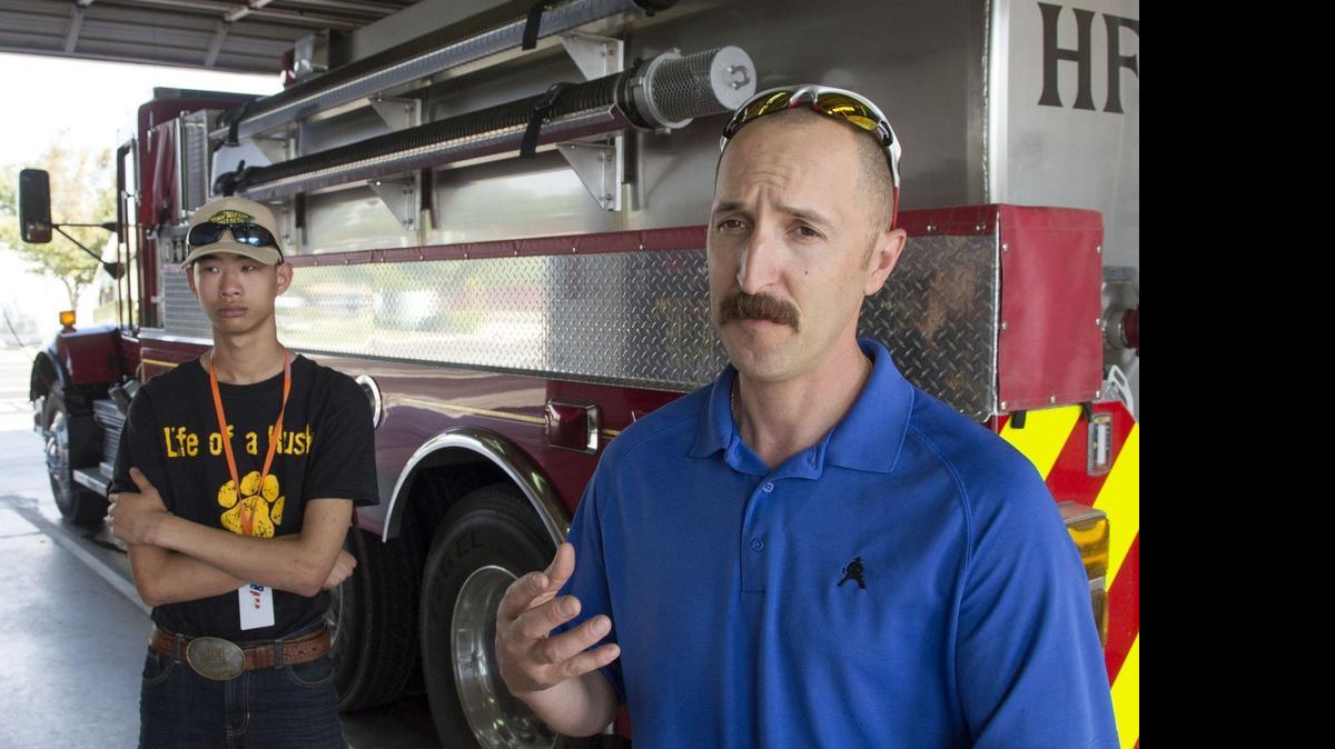 
Hughson Fire Department Capt. Jeff Serpa, right, says an on-campus defibrillator and staff trained to use the device could have gotten Andrew Joliff’s heart restarted sooner after Joliff experienced cardiac arrest at Hughson High School in November.
