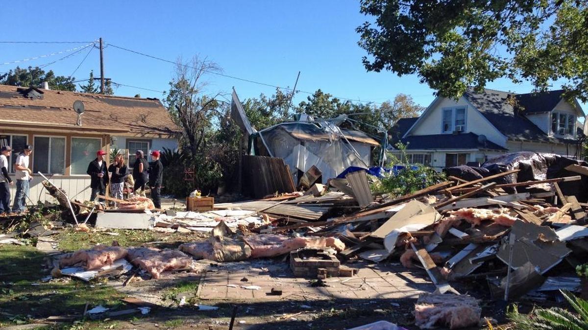 There was plenty of damage, and a lot of work, taking place along Zeering Road in Turlock, Calif., on Monday, Nov. 16, 2016, a day after a tornado touched down in the Stanislaus County town.