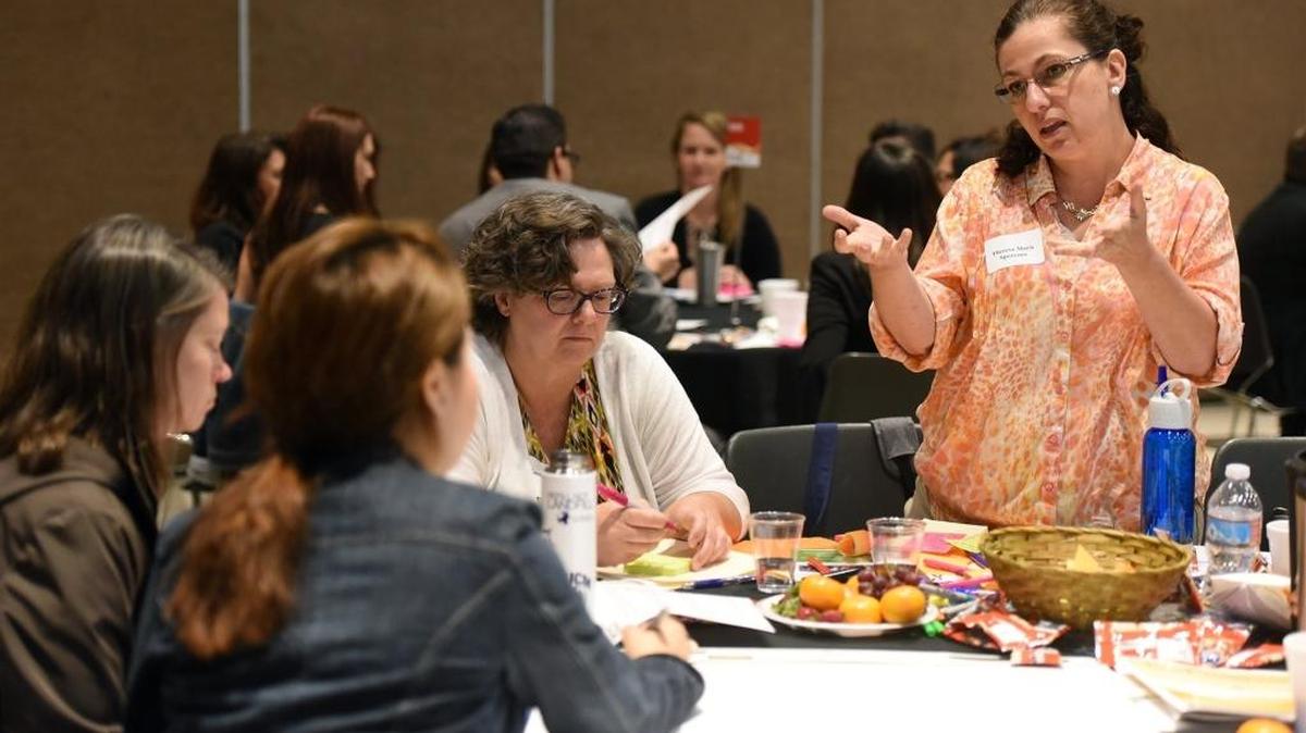 Theresa Spezzano with UC Cooperative Extension works with her group Thursday, April 28, 2016, during the Connecting for Good event at Modesto Centre Plaza.
