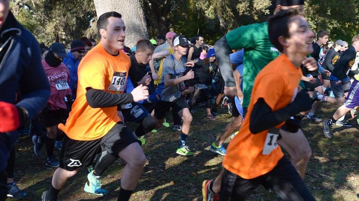 Runners start the 5K run Thursday morning at Tuolumne River Regional Park during the Turkey Trot and Gobbler Walk in Modesto.