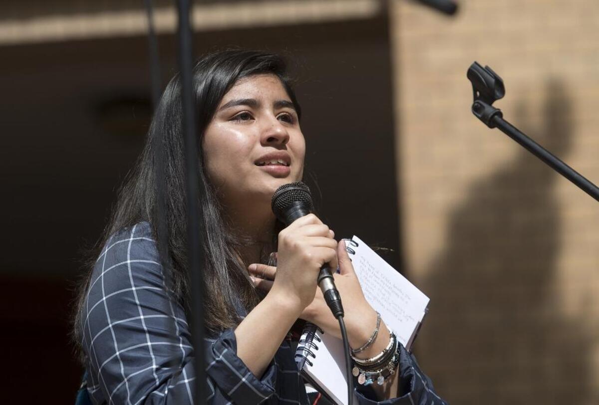 Estela Arreola, 17, tells the story of being a first generation American during the Immigrants March in Modesto, Calif., on Saturday, May 6, 2017.