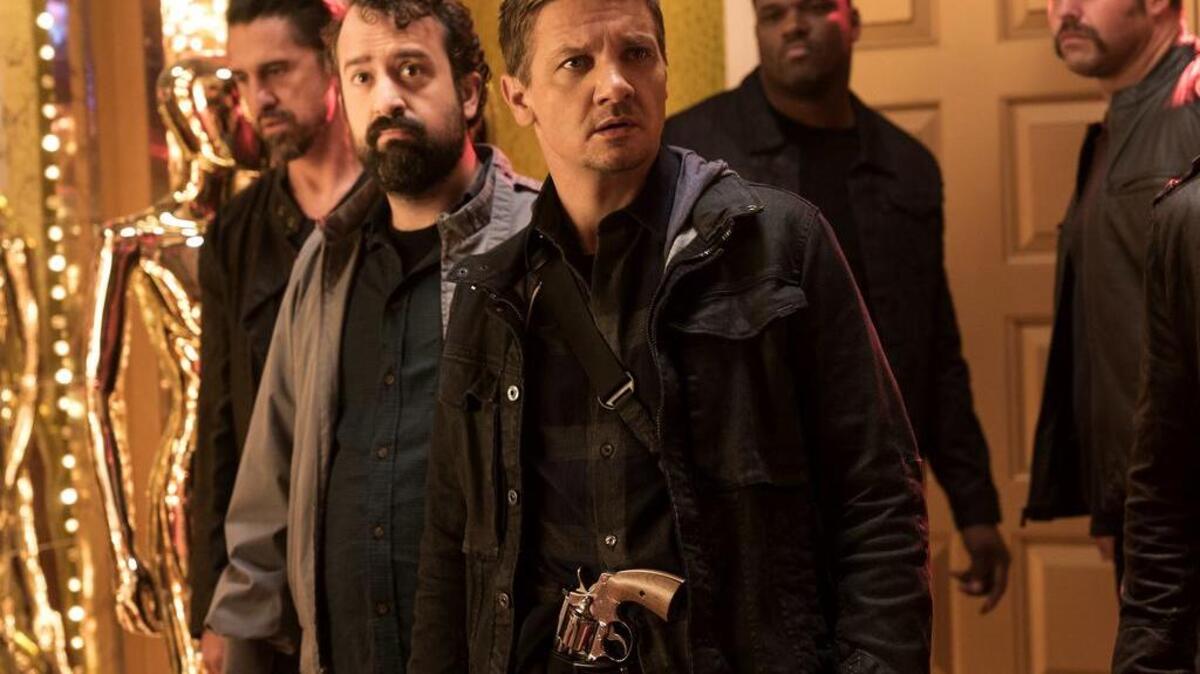 Modesto native Jeremy Renner, center, in a scene from "The House."