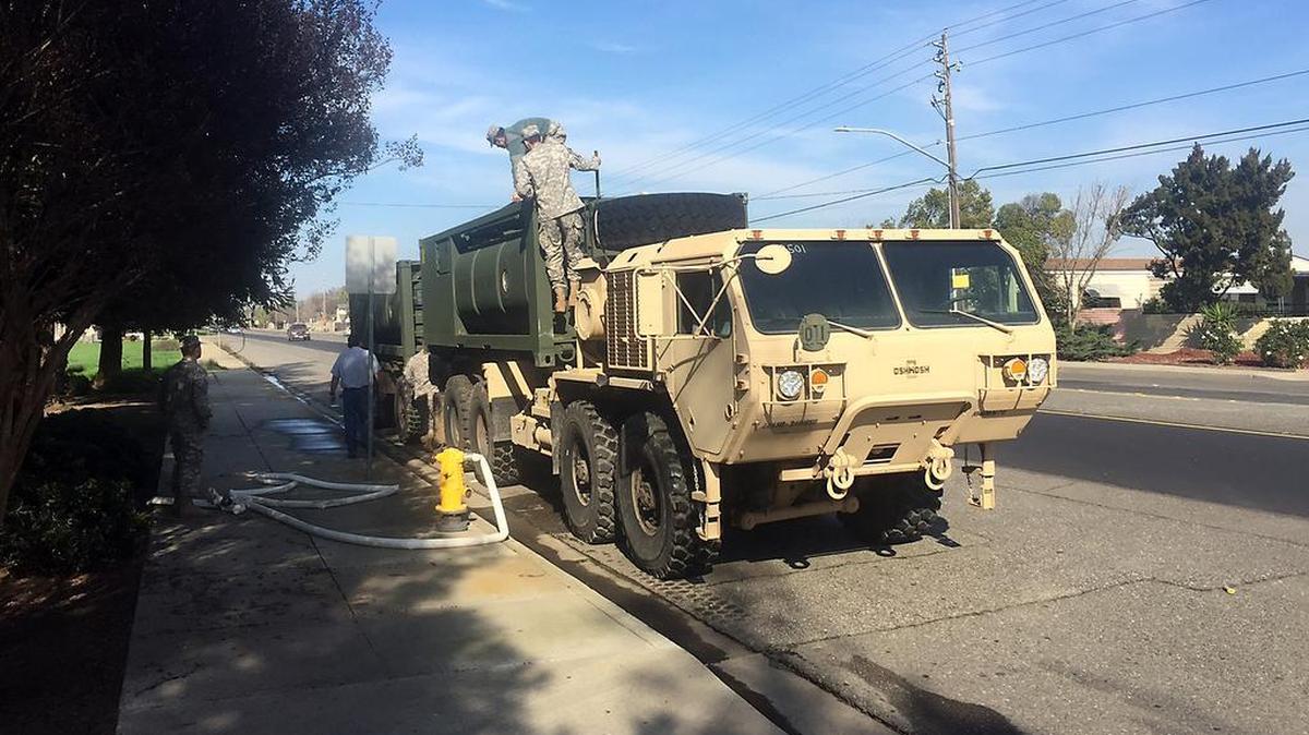 Three water tankers from the California National Guard picked up 5,400 gallons of Modesto water Jan. 27, 2016 from a city fire hydrant.