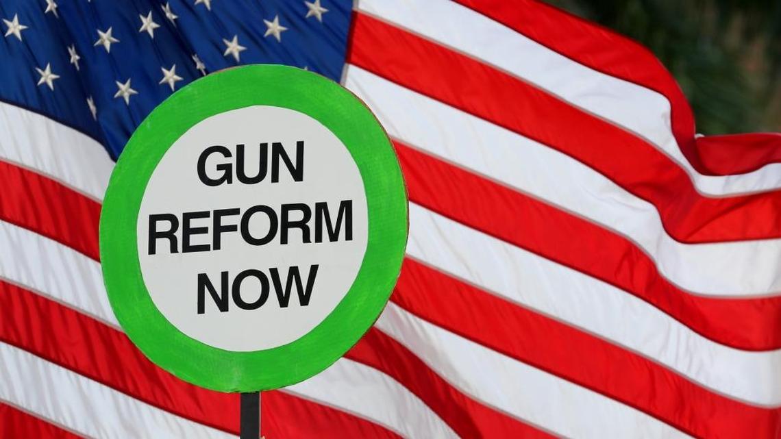 Protesters attend a rally at the Federal Courthouse in Fort Lauderdale, Fla., to demand government action on firearms in the wake of the Stoneman Douglas High School shooting.