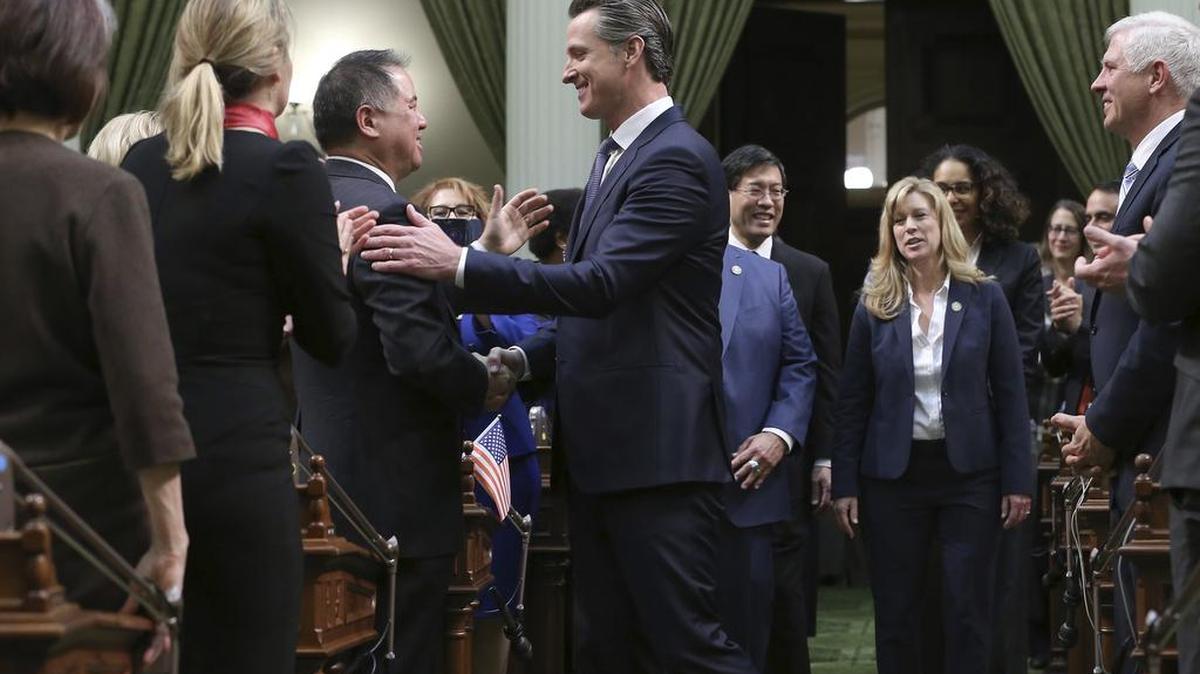 Gov. Gavin Newsom enters the Assembly Chambers to deliver his first state of the state address to a joint session of the legislature.
