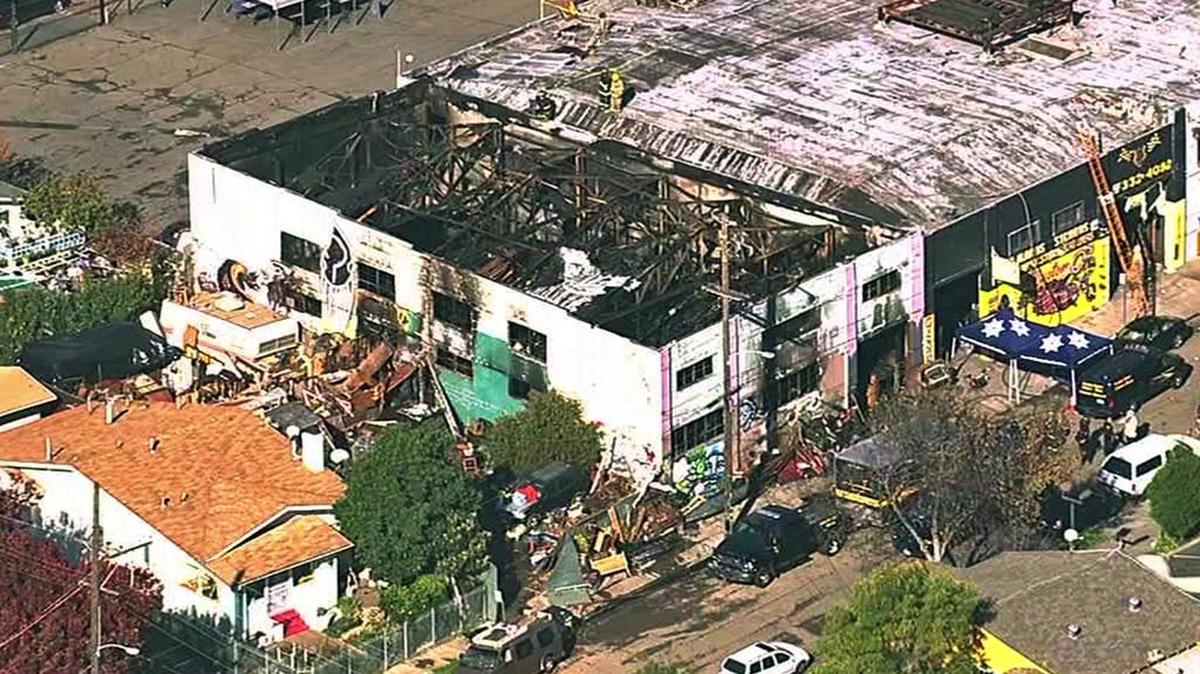 The remnants of the Ghost Ship warehouse after a blaze that killed at least 36 people.