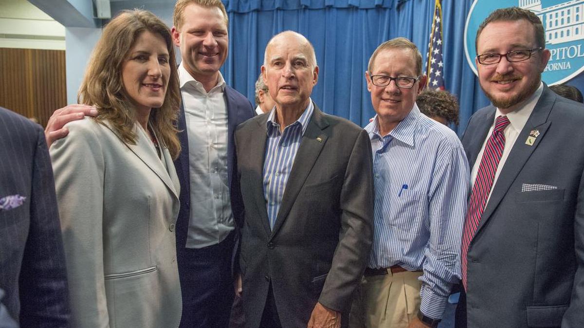 Gov. Jerry Brown is surrounded by Republican legislators who helped pass key climate change legislation known as Cap & Trade in 2017. From left are Assemblywonan Catharine Baker, R-San Ramon, Assembly Minority Leader Chad Mayes, R-Yucca Valley, Sen. Tom Berryhill, R-Twain Harte and Assemblyman Devon Mathis, R-Visalia.