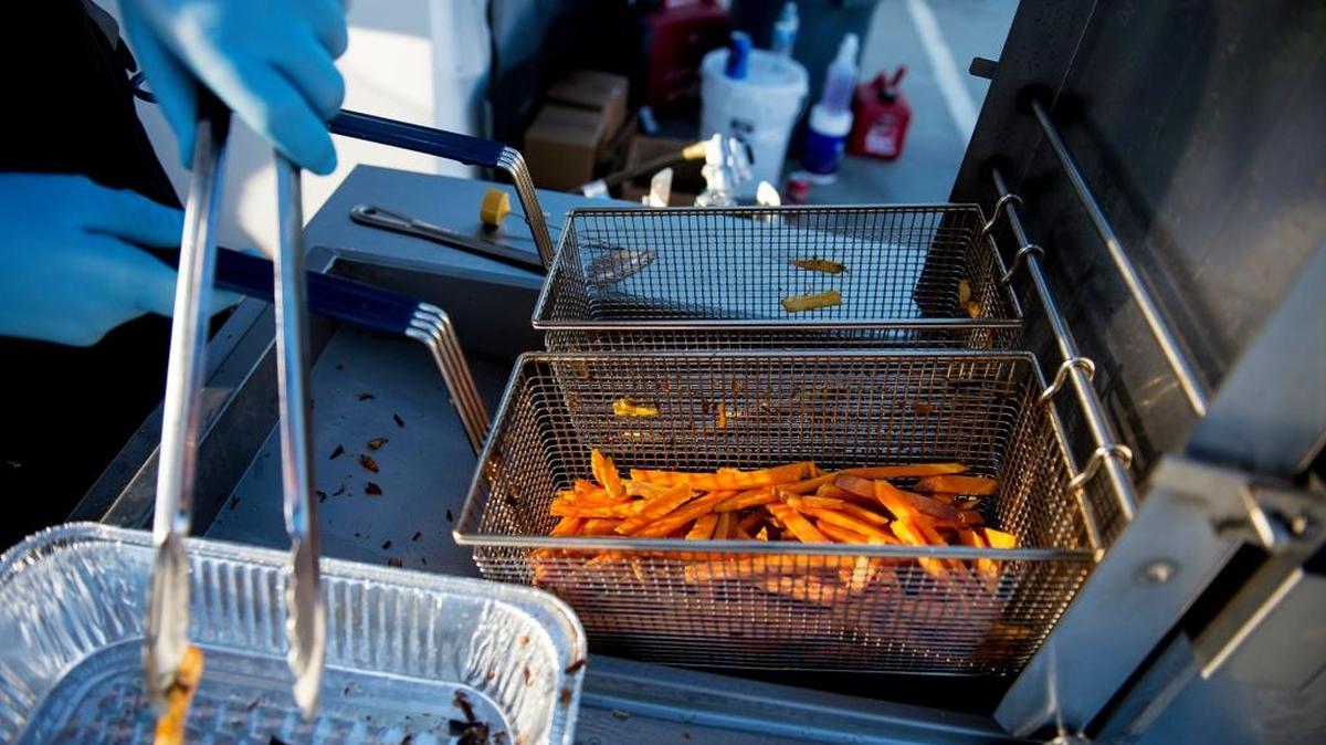 Sweet potato fries are prepared at one of the booths of the annual Livingston Sweet Potato Festival in October.