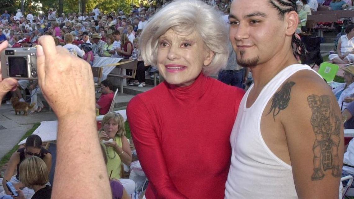 Carol Channing poses for a photo with Noe Estrada of Modesto prior to the Modesto Band concert at Graceada Park in 2004.