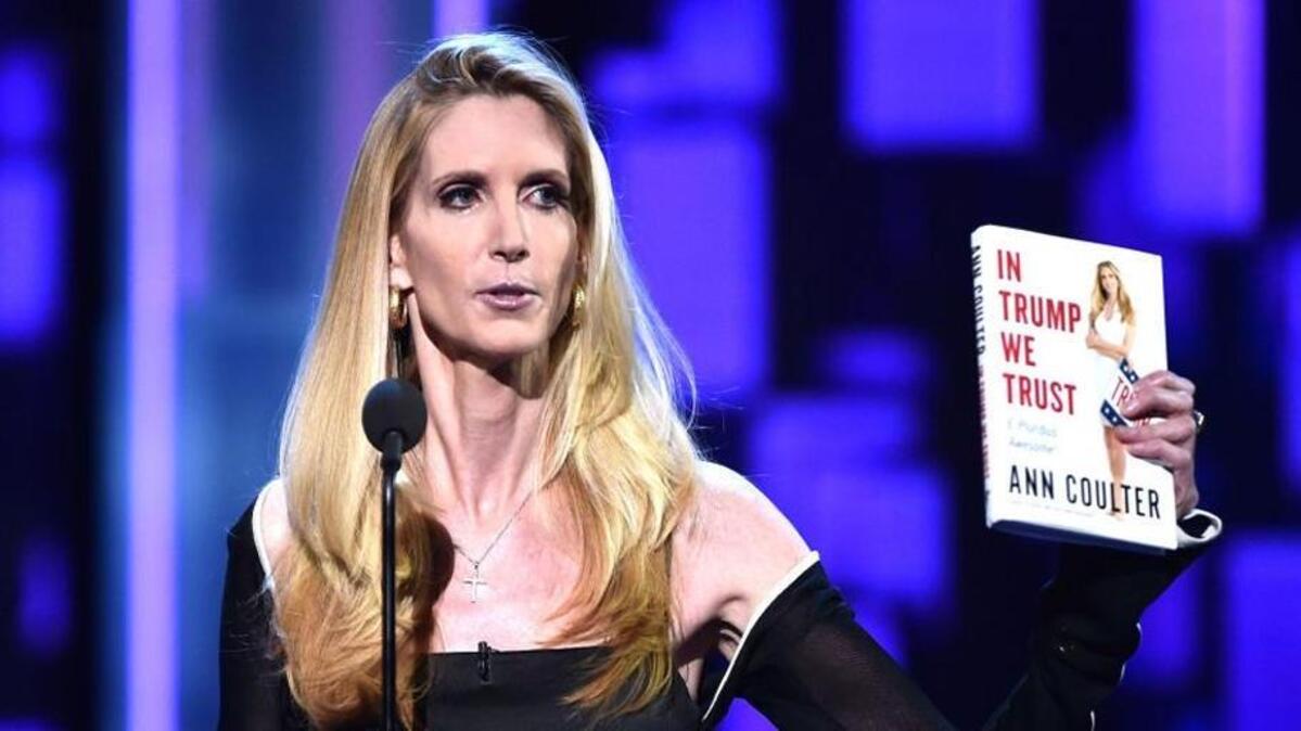 Ann Coulter holds up her latest book during the Comedy Central roast of Rob Lowe, during which she was subjected to a lot of verbal abuse.