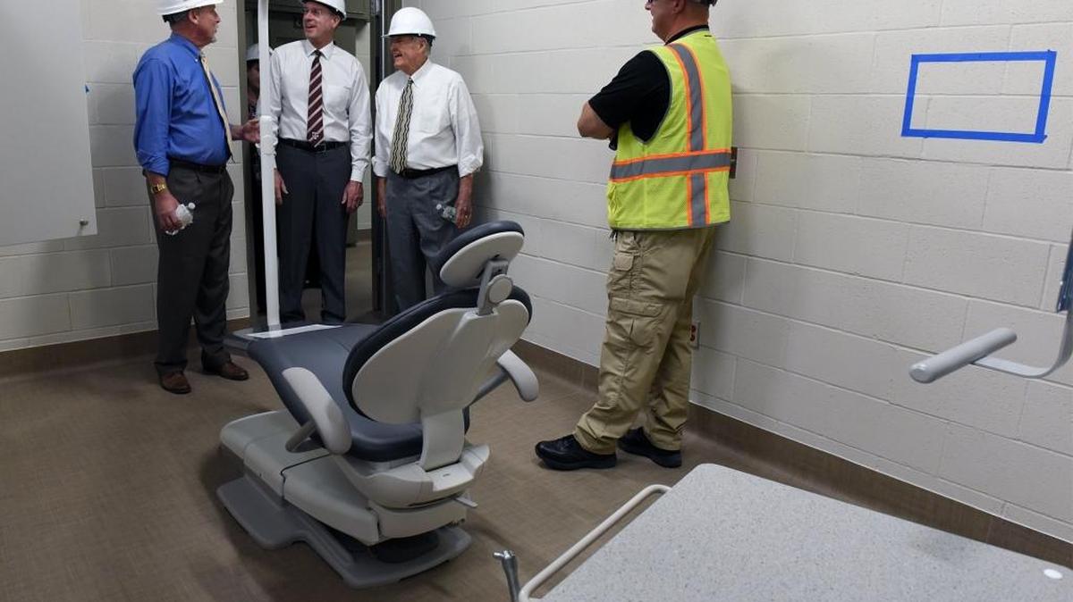 Former Stanislaus County CEO Stan Risen, far left, gets a tour of the new county jail with county supervisors Terry Withrow and Dick Monteith from lieutenant Steve Traverso. The new jail was one of the many things that was done during Risen’s tenure at the top.