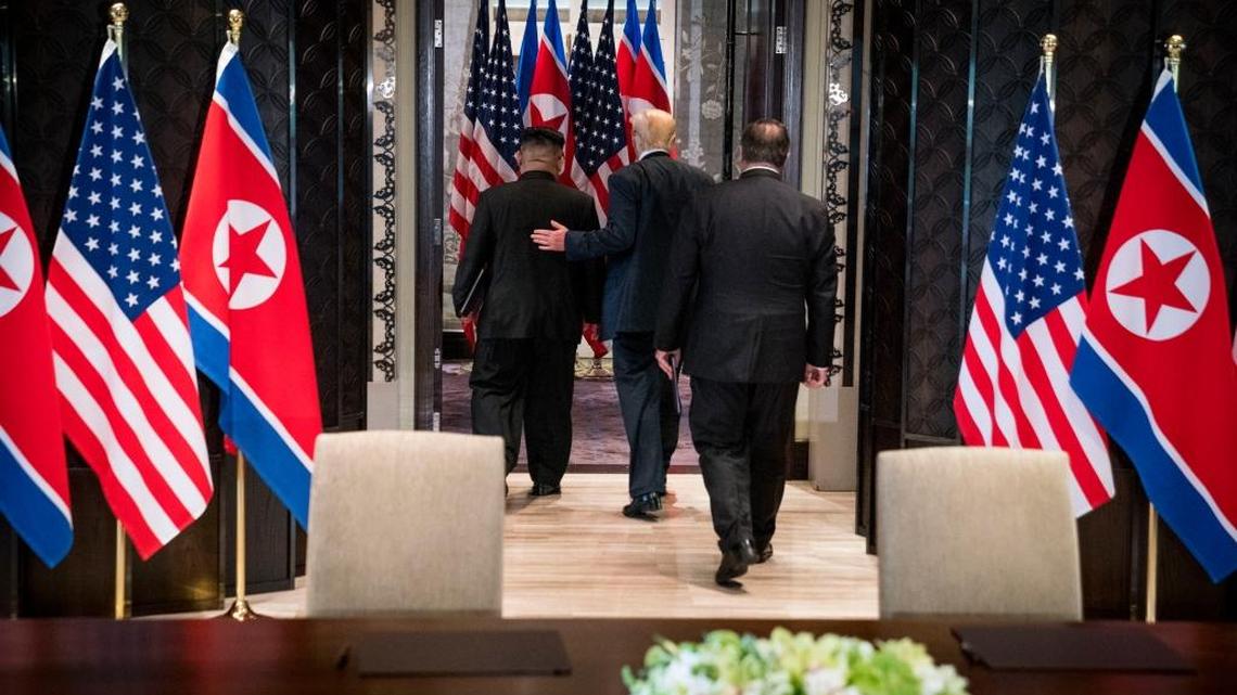 President Donald Trump and Kim Jong Un of North Korea depart after a document-signing ceremony on Sentosa Island in Singapore.