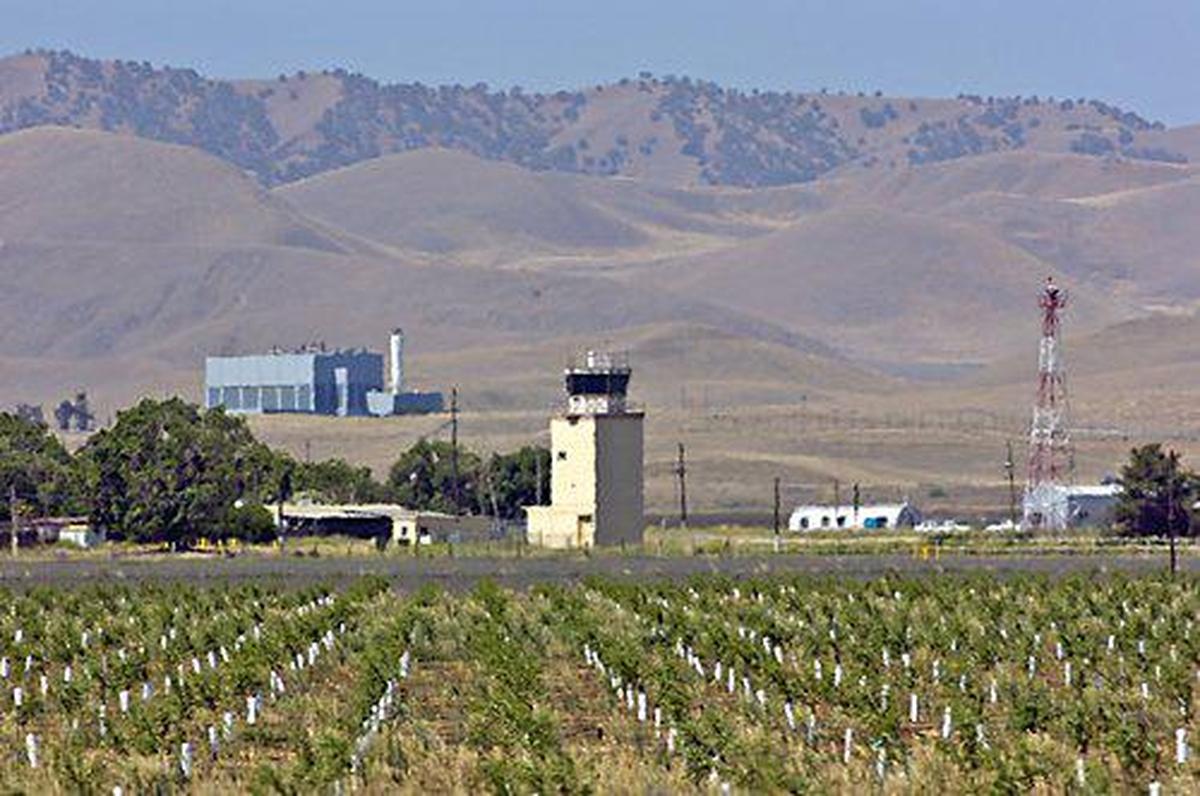 The Stanislaus County landfill facility at Fink Road stands on the foothills of the Diablo Range four air miles southwest of the Crows Landing air strip on Monday, June 11, 2007. The future of life on the West Side hinges on development plans for the former US Navy base at Crows Landing, a delicate balancing act between an agricultural-based economy, a burgeoning real estate market and industrial development. The air traffic control tower at Crows Landing rises one mile beyond the photographer’s vantage point on Highway 33. Ted Benson/The Modesto Bee