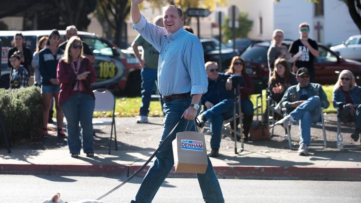 U.S. Representative Jeff Denham waves to the crowd during the Veterans Day Parade on Needham Street in Modesto in November.