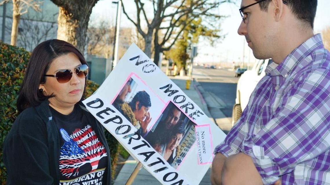 Democratic Congressional candidate Josh Harder, right, and Cecilia Flores of Modesto take part in a protest against recent federal actions against undocumented immigrants in March in front of Rep. Jeff Denham’s office.