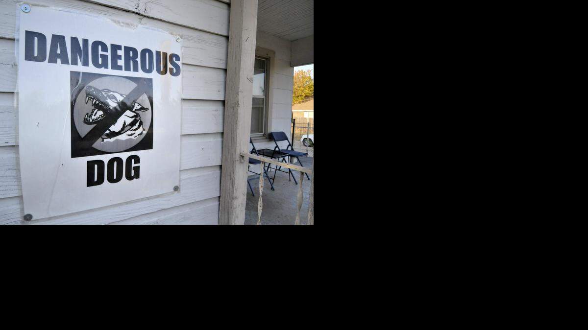 
The man who owned two pit bulls that attacked a Texas man in 2011 had this sign posted on his property. 

