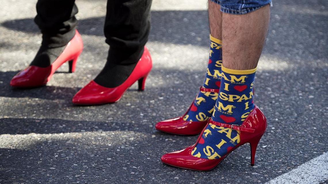 Two men stand ready to walk a mile in high heels in support of the Haven Women’s Center last year. It is one of two events that are crucial to raising money for the Haven. The other is Kick Up Your Heels, which is Thursday Night at The Century.