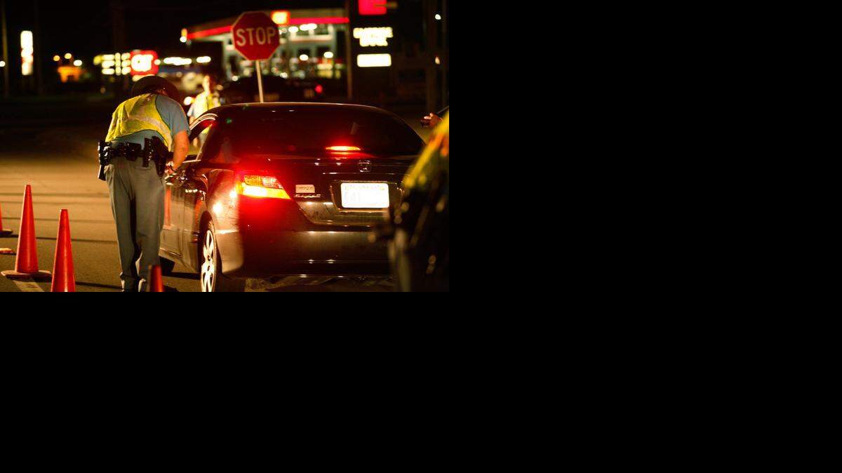 
A sheriff’s deputy in Kansas works a DUI checkpoint.
