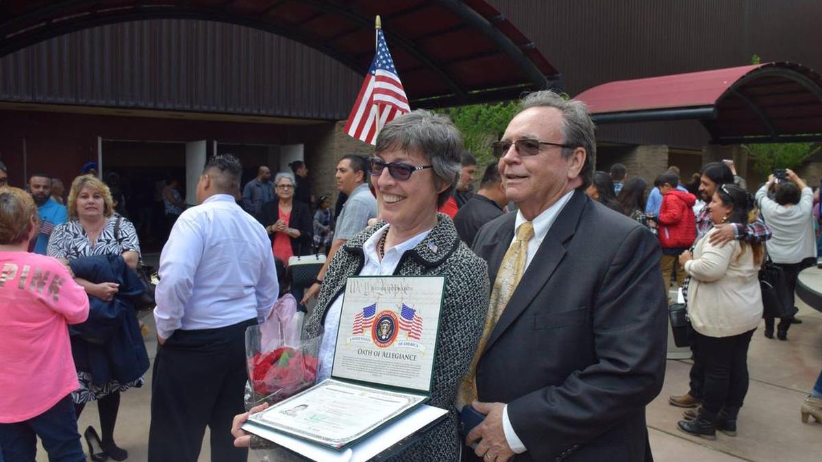 Ana Lynch, with husband Mike, was one of several hundred to take the oath of citizenship in Fresno last week. It is a significant and moving ceremony.