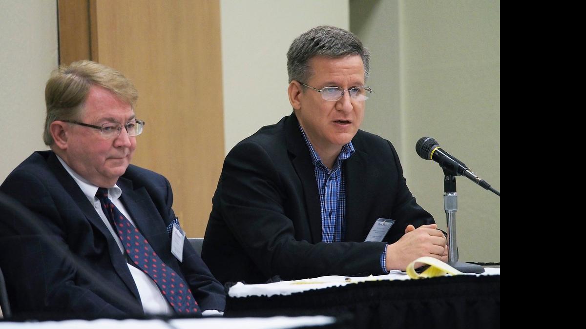 
David L. White, right, CEO of the Stanislaus Business Alliance, speaks last year at the North San Joaquin Valley Regional Economic Assessment Conference at the Modesto Centre Plaza. At left is Mike Ammann, president and CEO of the San Joaquin Partnership.
