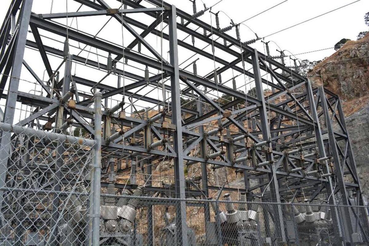 Transmission lines from a power plant at Don Pedro Reservoir carry electricity to customers of the Modesto and Turlock irrigation districts, pictured in 2017.