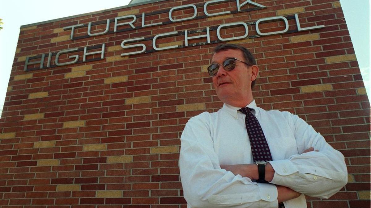 Tom Parker in front of Turlock High School changed the culture when he took over in 1979. He retired in 1997, leaving a legacy of discipline, love of learning and having fun.