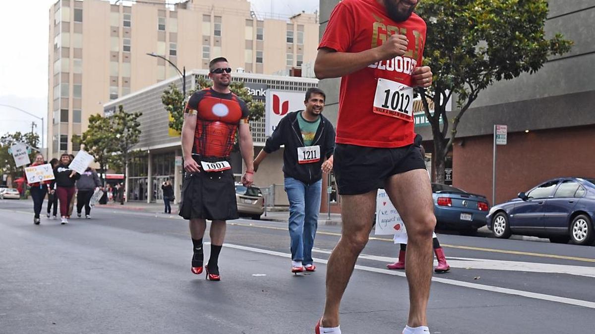 Esteban Garcia of Turlock makes his way down J Street last year for a community walk to raise awareness and funds for domestic violence and sexual assault awareness and prevention. The Haven Women’s Center Walk a Mile in Her Shoes, presented by Clear Channel, started at the Gallo Center for the Arts in downtown Modesto.
