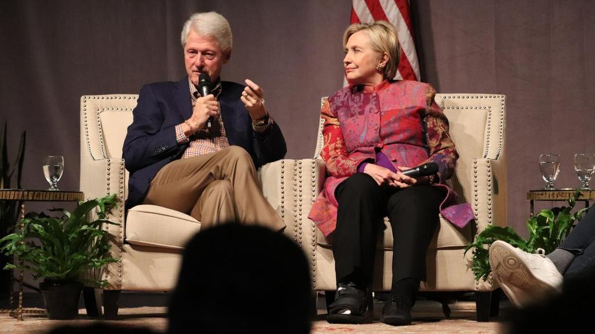 Former President Bill Clinton, accompanied by Hillary Clinton, speaks at a gathering in Little Rock, Ark., on Saturday, marking 25 years since his election.