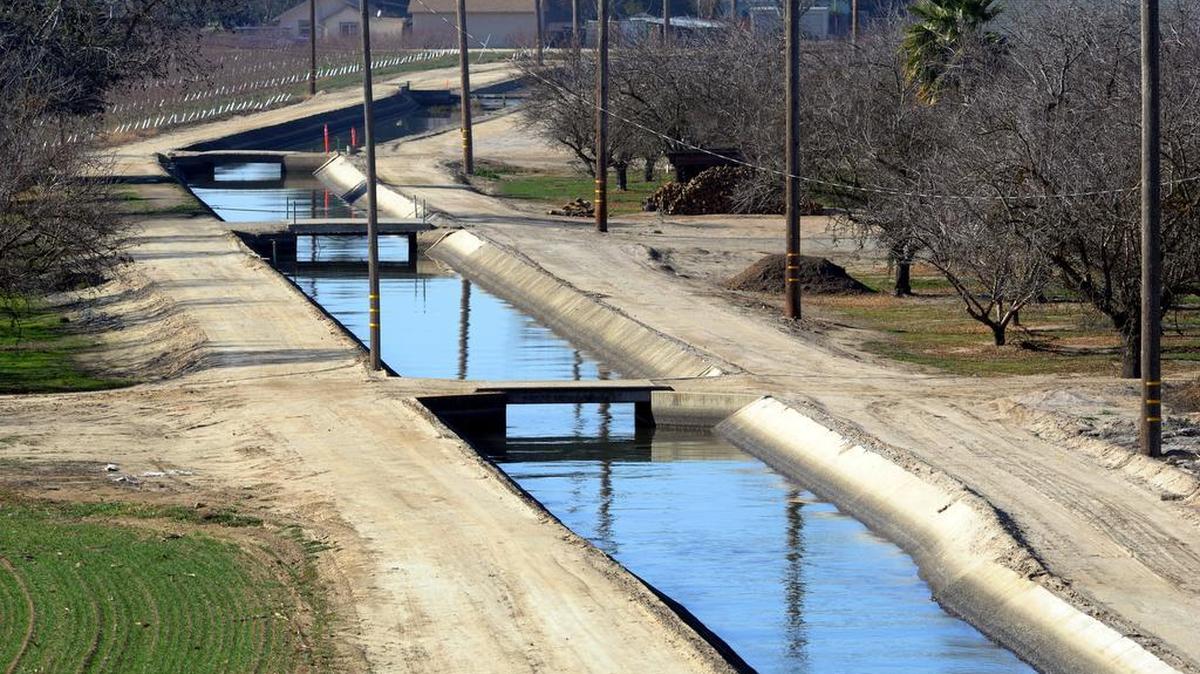 Irrigation water flows down an MID canal about 3 miles from the Tuolumne River.