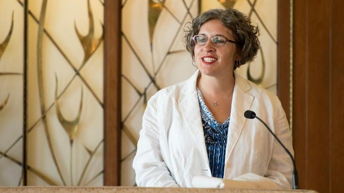 The Rev. Darcy Baxter of the Unitarian Universalist Fellowship gives the invocation during the rabbinic installation ceremony of Rabbi Shalom Bochner at Congregation Beth Shalom in Modesto, Calif., on Sunday, August, 16, 2015.