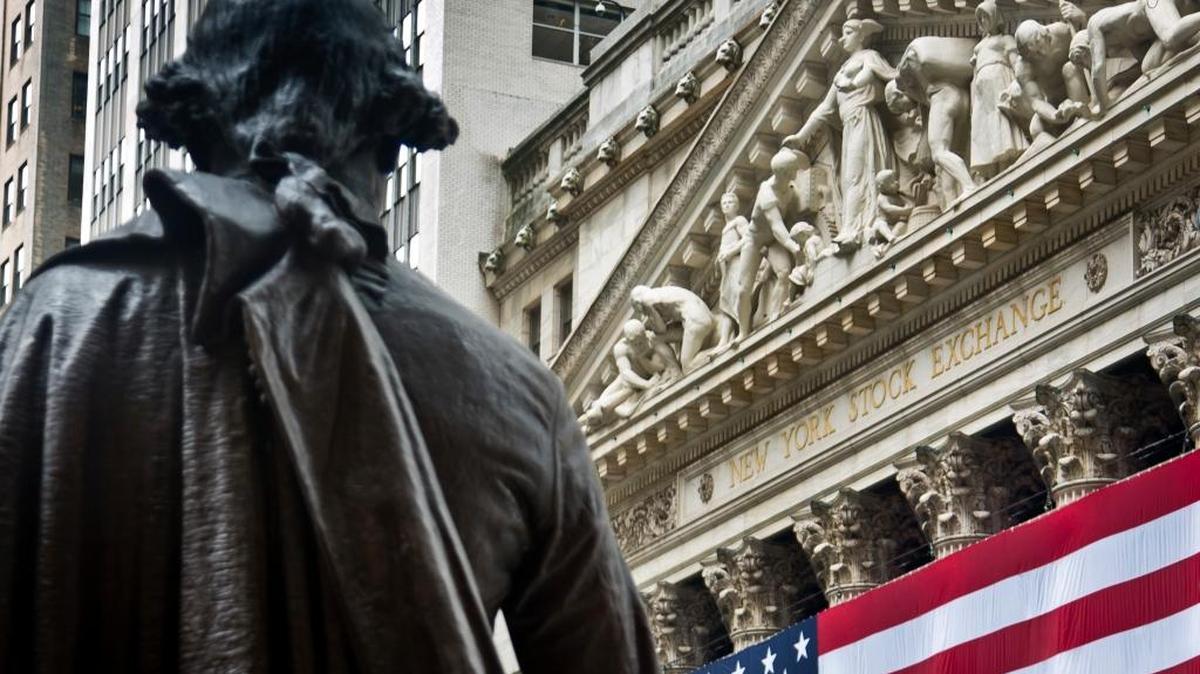 A statue of George Washington, a man devoted to the founding of our nation and its constitution, looks over the New York Stock Exchange near where he was first sworn into office.