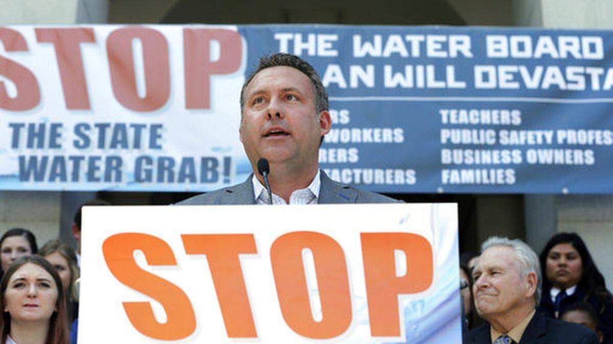 Assemblyman Adam Gray, D-Merced, speaks at a rally against a proposal by state water officials to increase water flows for the lower San Joaquin River to protect fish, at the Capitol, Monday, Aug. 20, 2018, in Sacramento, Calif. The State Water Resources Control Board is holding hearings this week concerning a plan to allow more water to flow freely down the Sacramento-San Joaquin River Delta from February to June, meaning less water will be available for farming and other needs.