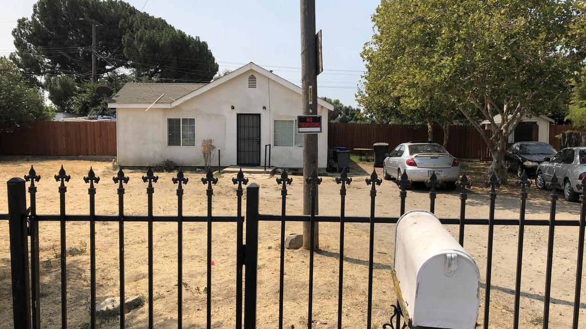 1. This is 1306 Garden Avenue as it appears today. New tenants have fixed the front gate and put up the back fence.