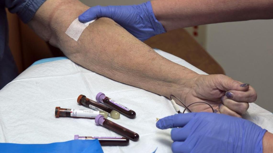 A kidney dialysis patient has blood drawn for testing.