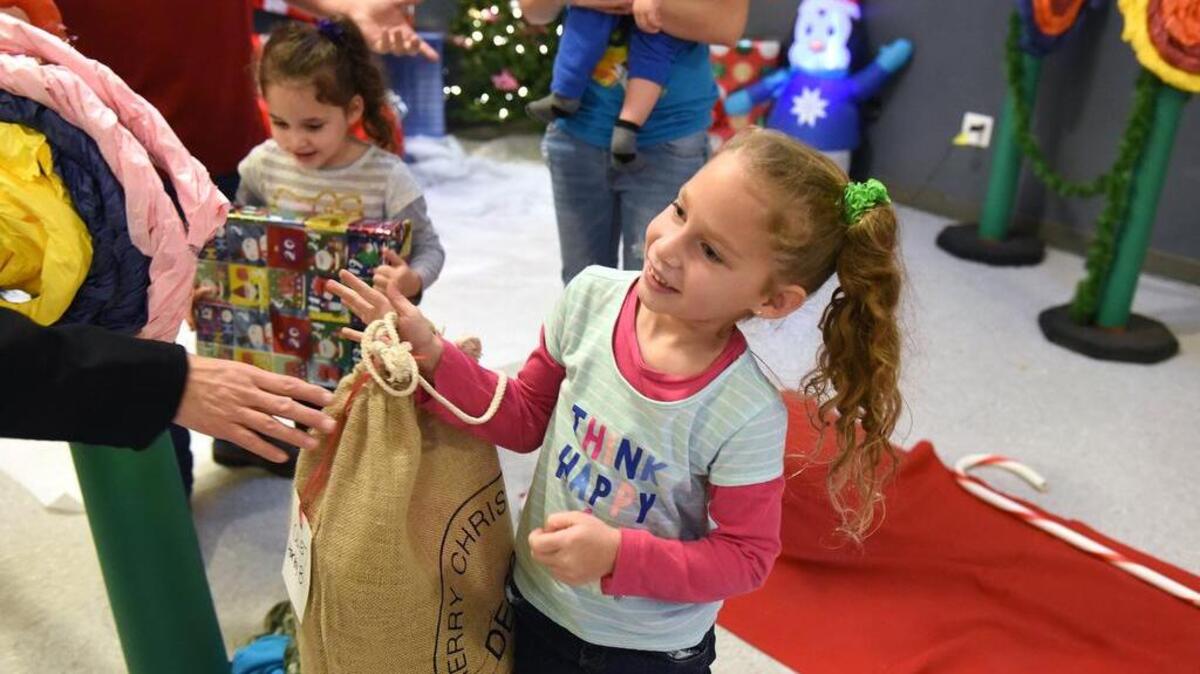 Hailey Bizzanelli, age 5, carries a bag she received in 2017 during a “Letters to Santa” event at Caswell Elementary School in Ceres. The non-profit was organized by Modesto firefighter Justin Crone, and helps over 500 families at a dozen schools in Stanislaus County each year.