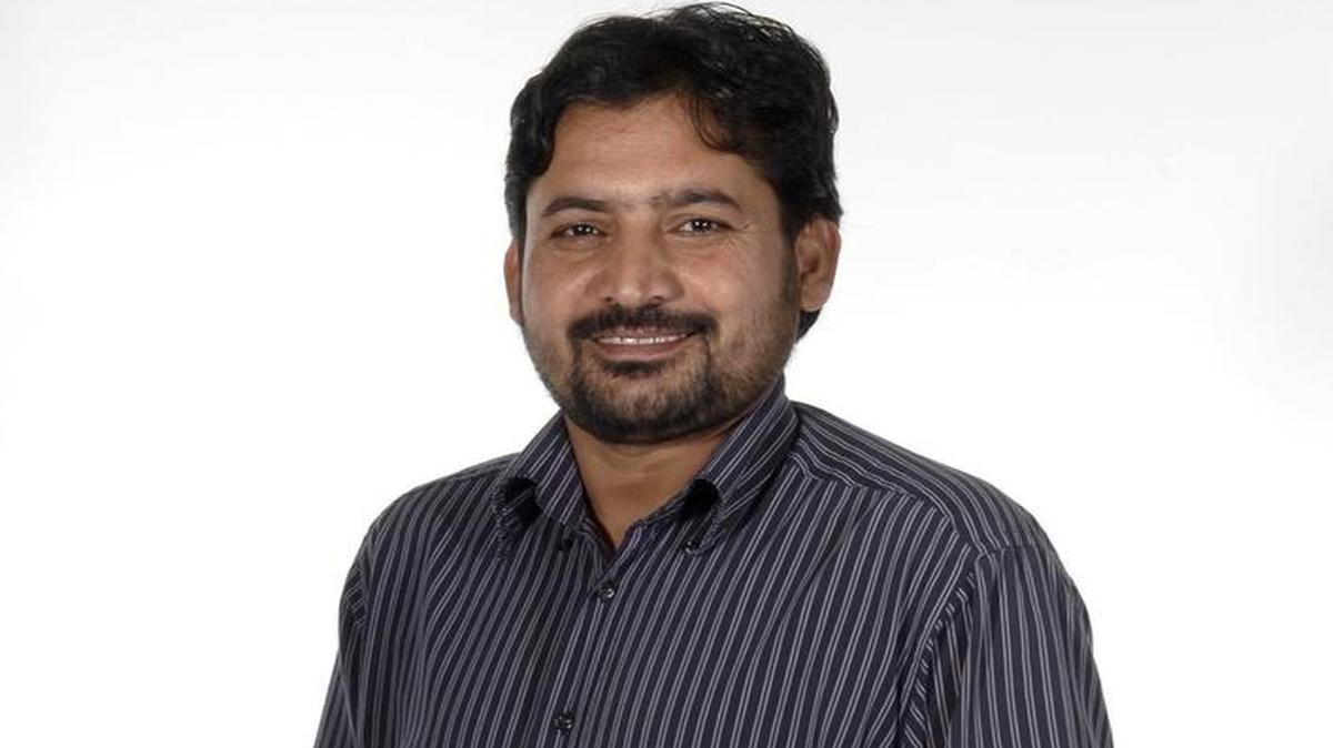 
Naimat Khan, visiting journalist.
