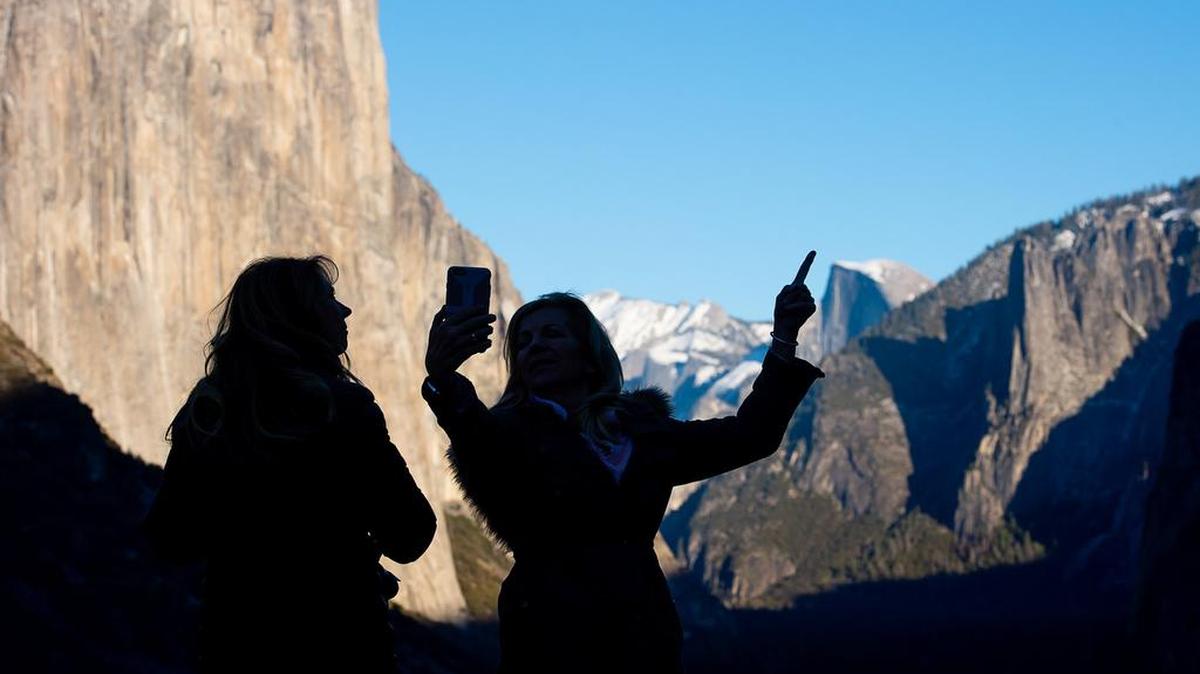 Two tourists visit Yosemite National Park in January, finding it uncrowded but also finding very few services.