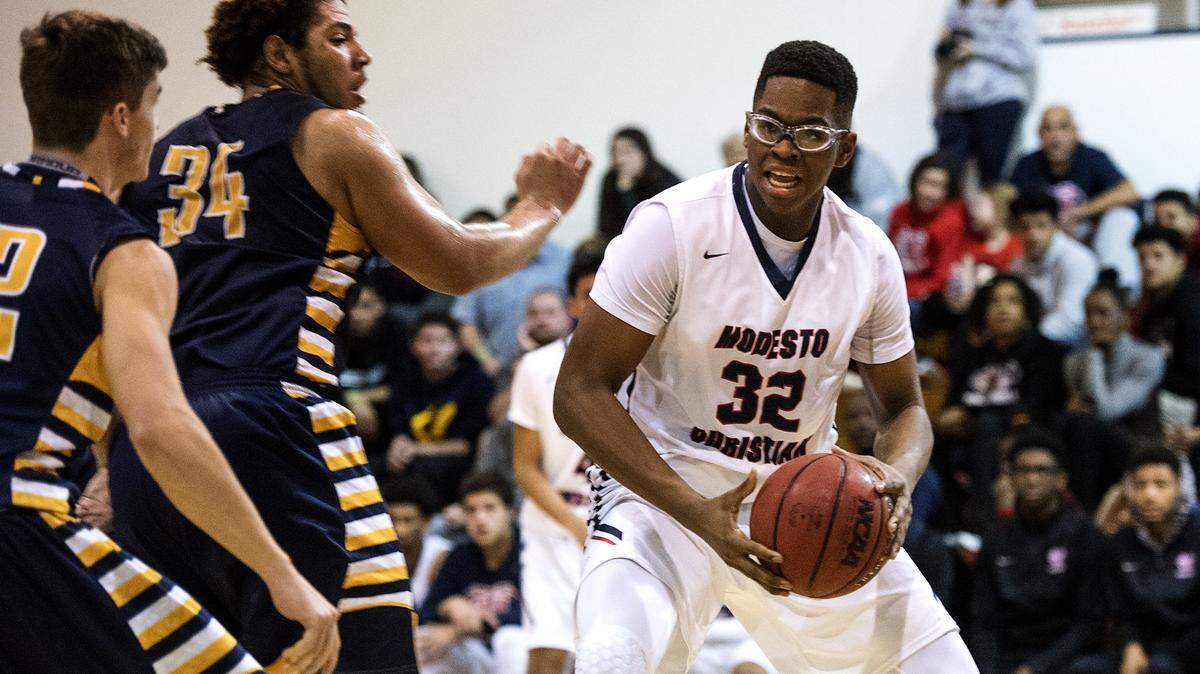 Modesto Christian center Gabe Murphy makes a move to the basket during the 17th Holiday Hoop Classic game with Turlock at Modesto Christian High School in Salida, Calif., Wednesday, Dec. 28, 2016.