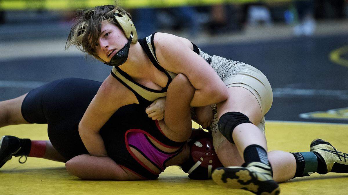 Enochs wrestler Rory Coscia wrestles Lincoln's Katherine Hayden during the Lady Eagles Invitational at Enochs High School in Modesto on Saturday, Jan. 21, 2017. Coscia pinned Hayden for the victory.
