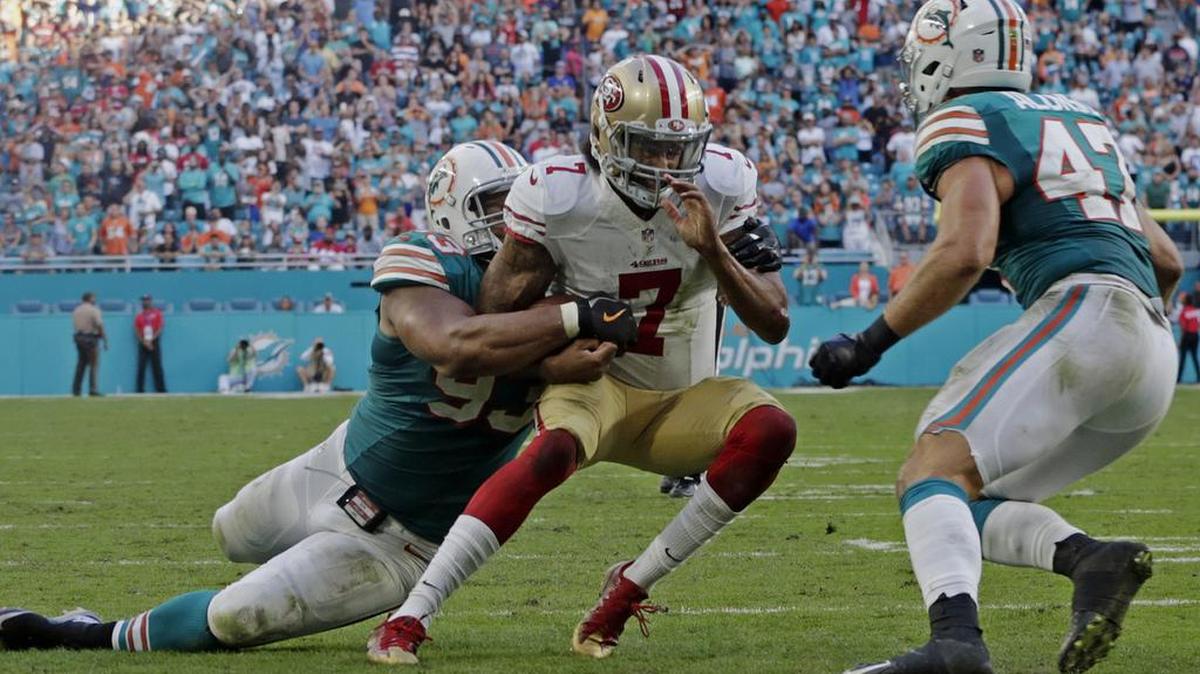 San Francisco 49ers quarterback Colin Kaepernick (7) is tackled by Miami Dolphins defensive tackle Ndamukong Suh near the end zone during the second half of an NFL football game Sunday, Nov. 27, 2016, in Miami Gardens, Fla.