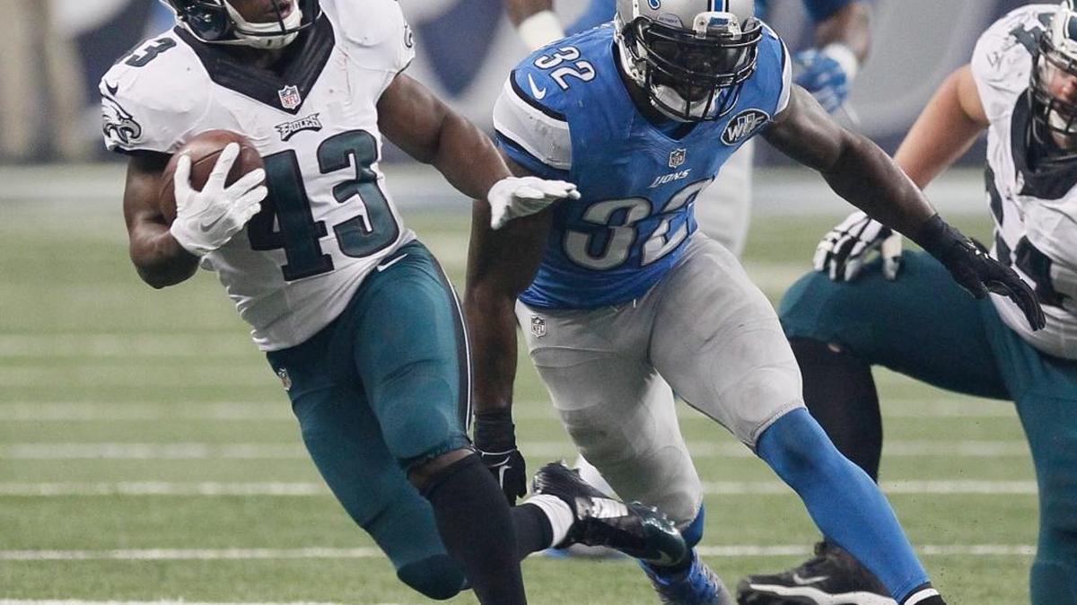 Philadelphia Eagles running back Darren Sproles (43) is pursued by Detroit Lions strong safety James Ihedigbo (32) during the second half of an NFL football game against the Detroit Lions Thursday, Nov. 26, 2015, in Detroit.