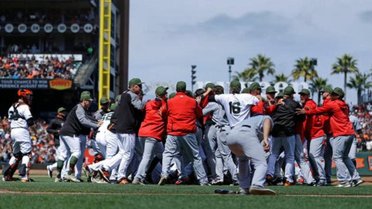 The Washington Nationals and San Francisco Giants scuffle after SF pitcher Hunter Strickland hit Washington’s Bryce Harper with a pitch.