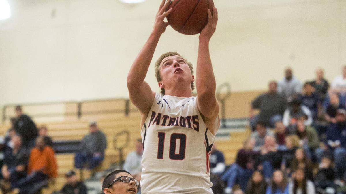 Beyer's Ben Polack goes for an open layup during the Modesto City Tournament Championship game between Beyer and Clovis West at Enochs High School in Modesto California on December 3, 2016.